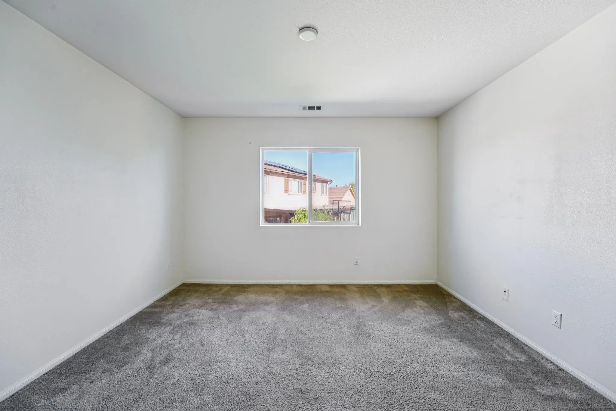 31890 Rouge Lane Menifee, CA 92584 - Photo 17 of 40 an empty room with a window