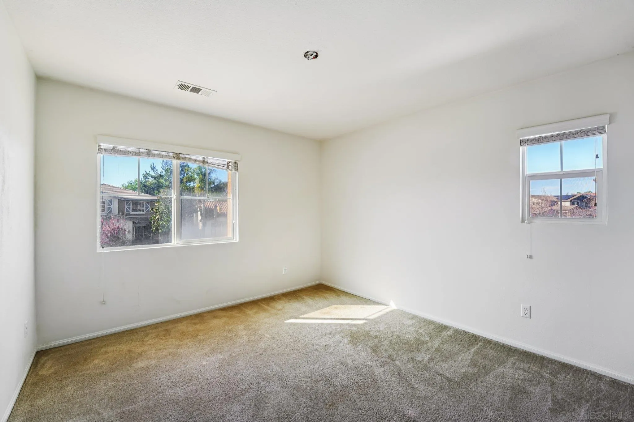 31890 Rouge Lane Menifee, CA 92584 - Photo 21 of 40 an empty room with windows