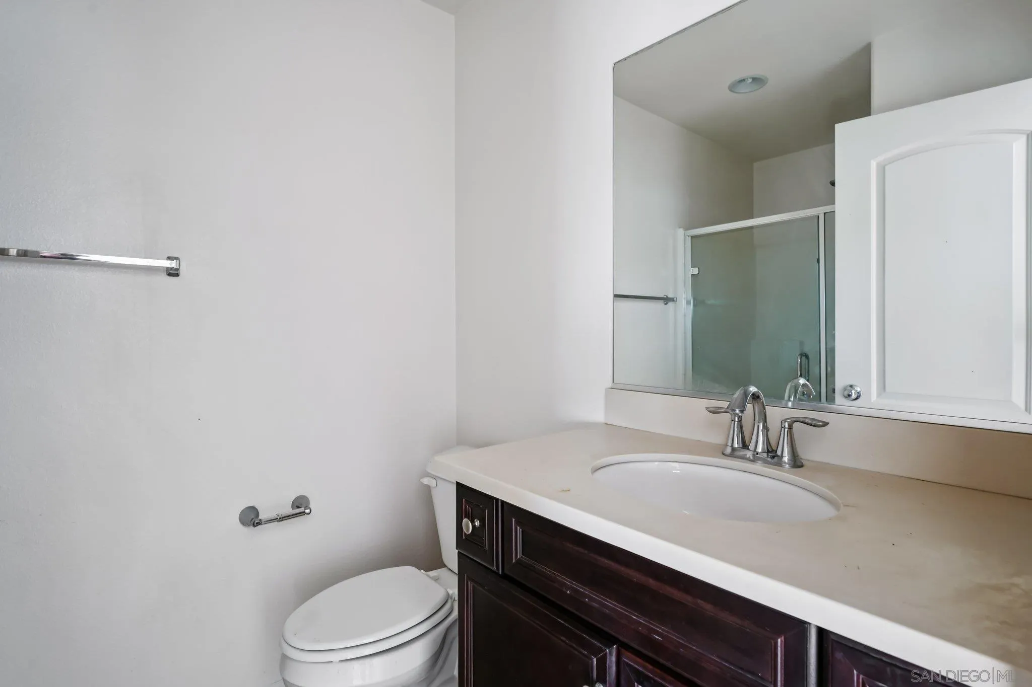 31890 Rouge Lane Menifee, CA 92584 - Photo 23 of 40 a bathroom with a sink toilet and vanity