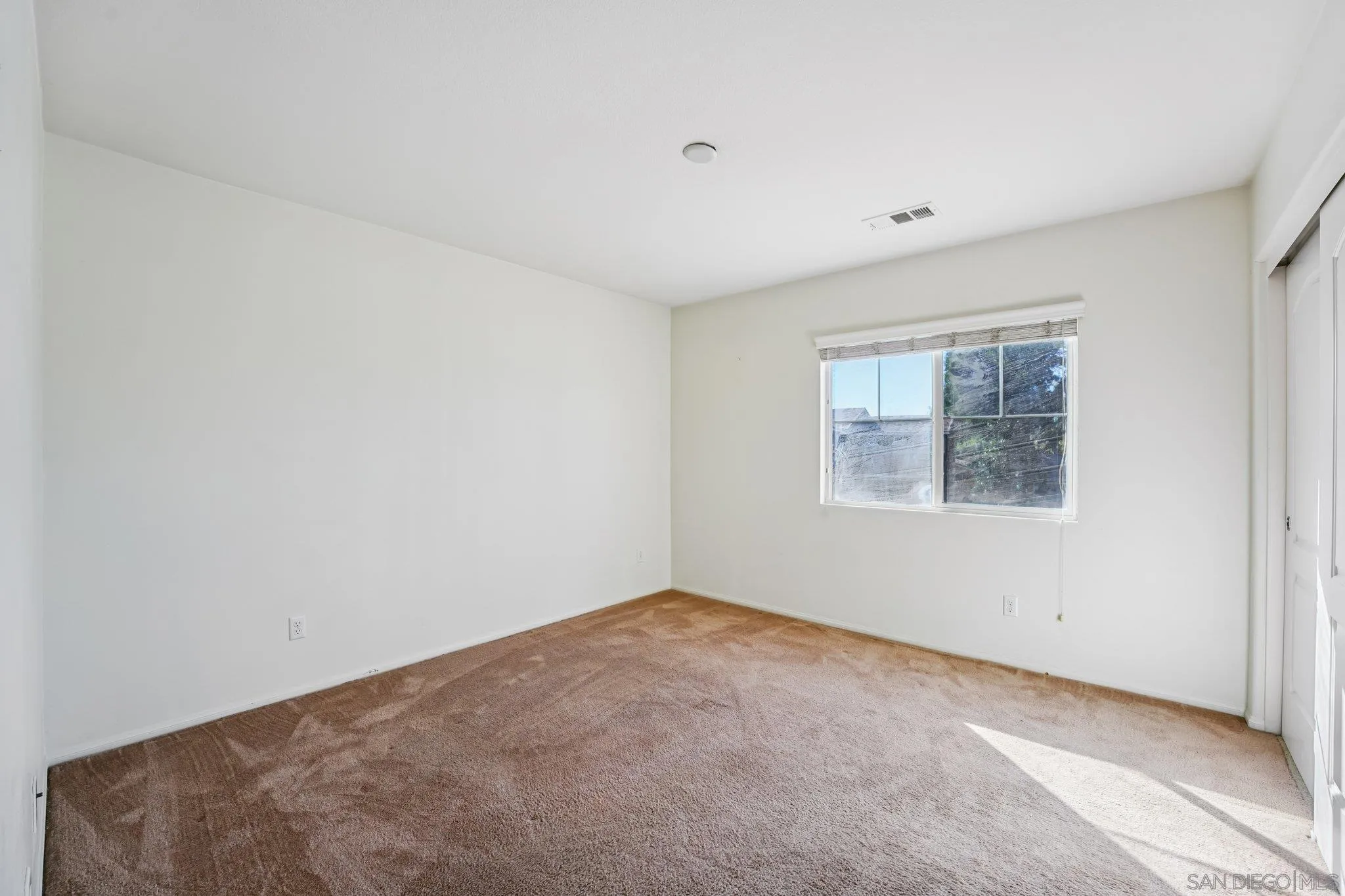 31890 Rouge Lane Menifee, CA 92584 - Photo 25 of 40 an empty room with a window
