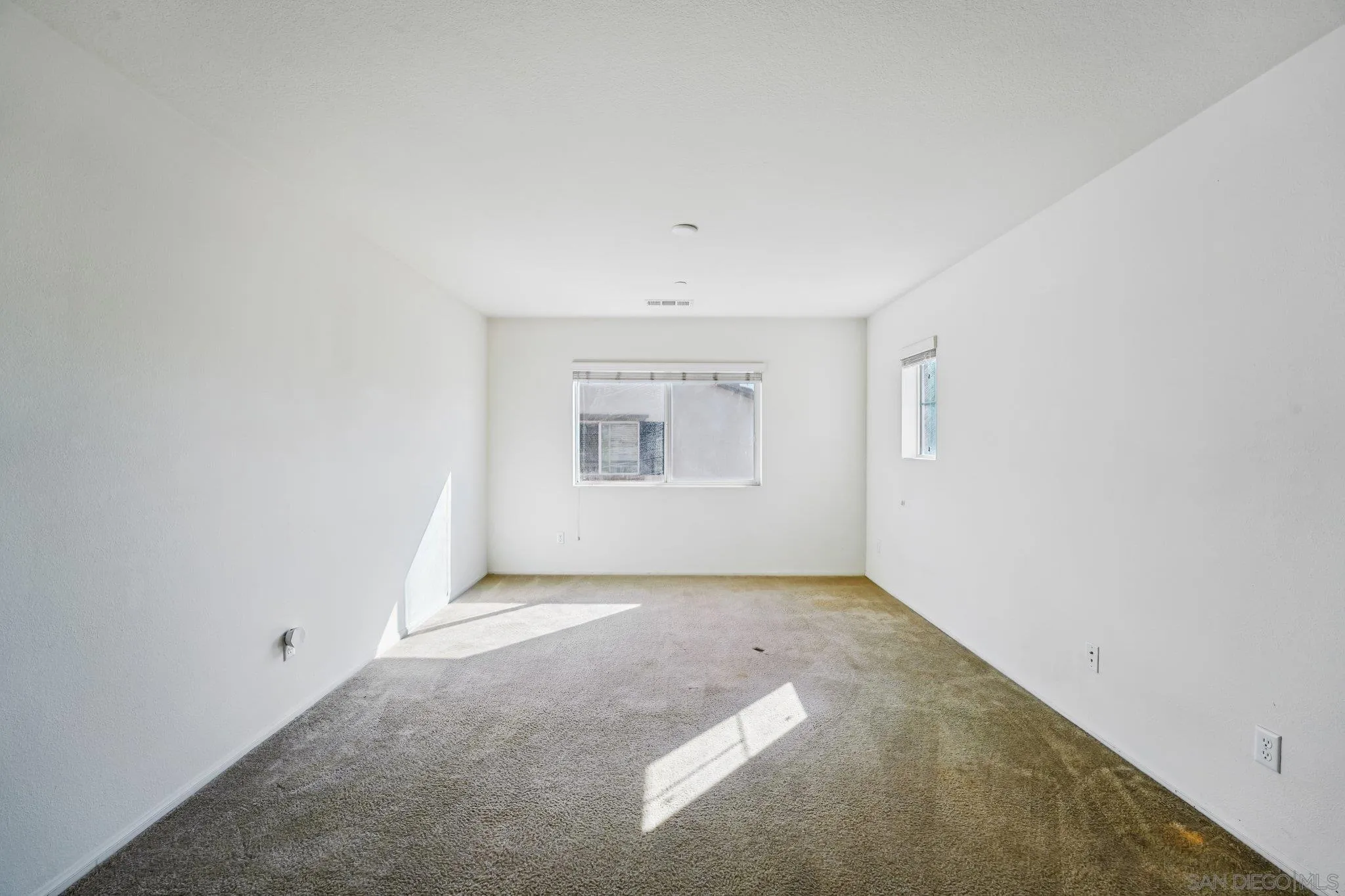 31890 Rouge Lane Menifee, CA 92584 - Photo 26 of 40 an empty room with windows
