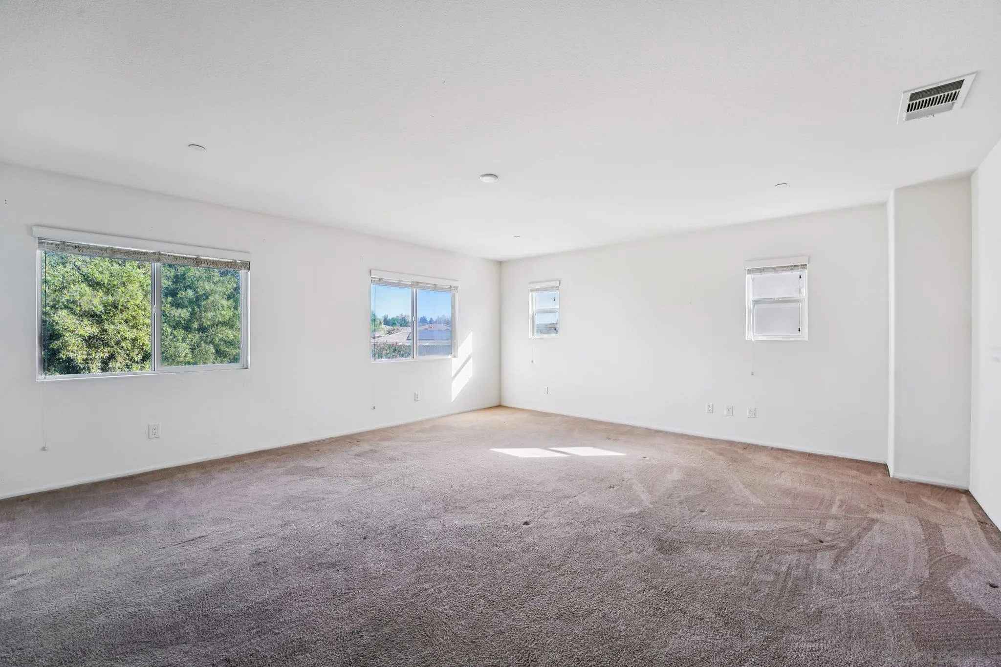 31890 Rouge Lane Menifee, CA 92584 - Photo 28 of 40 an empty room with windows
