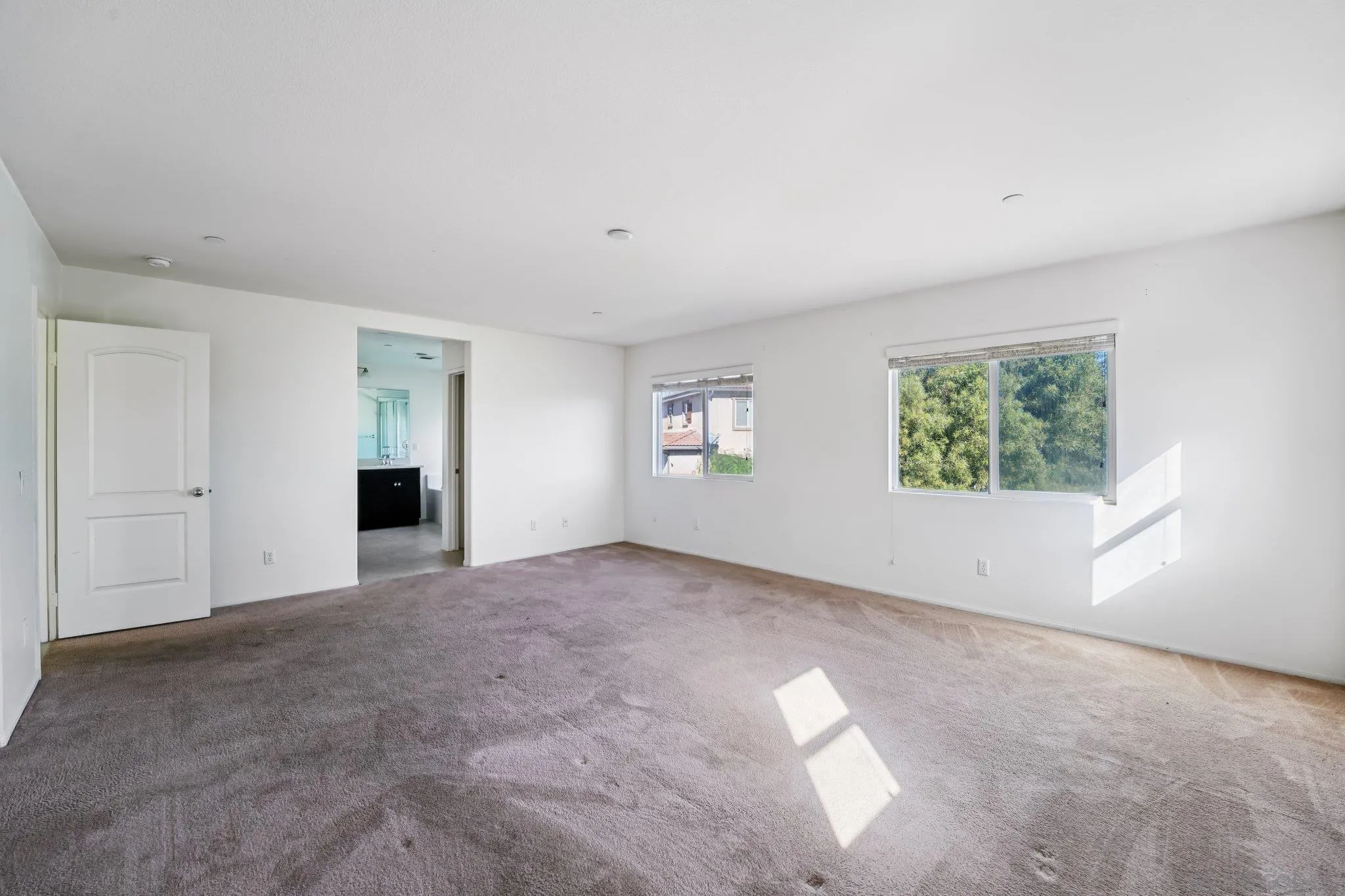 31890 Rouge Lane Menifee, CA 92584 - Photo 30 of 40 an empty room with windows