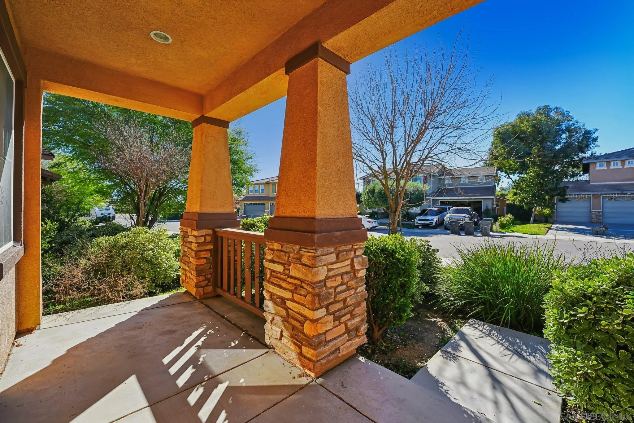 31890 Rouge Lane Menifee, CA 92584 - Photo 35 of 40 a front view of a house with garden