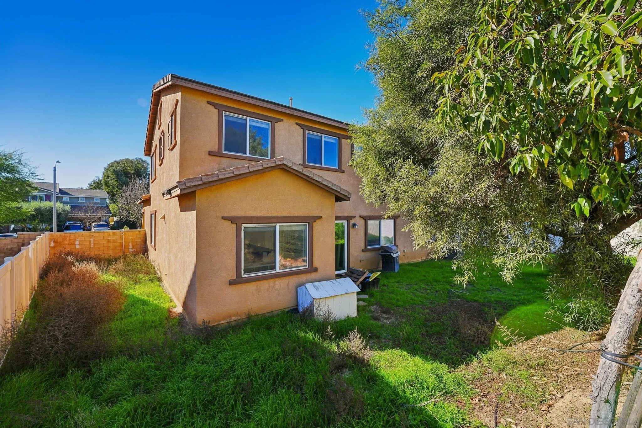 31890 Rouge Lane Menifee, CA 92584 - Photo 36 of 40 a front view of a house with a yard