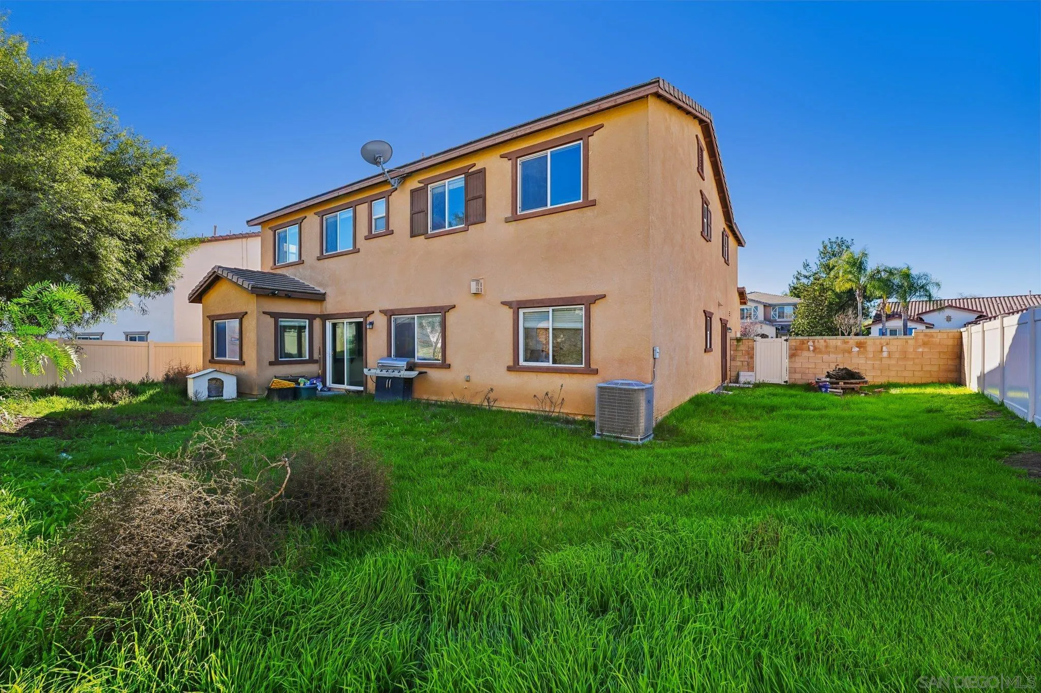 31890 Rouge Lane Menifee, CA 92584 - Photo 37 of 40 a front view of a house with a yard