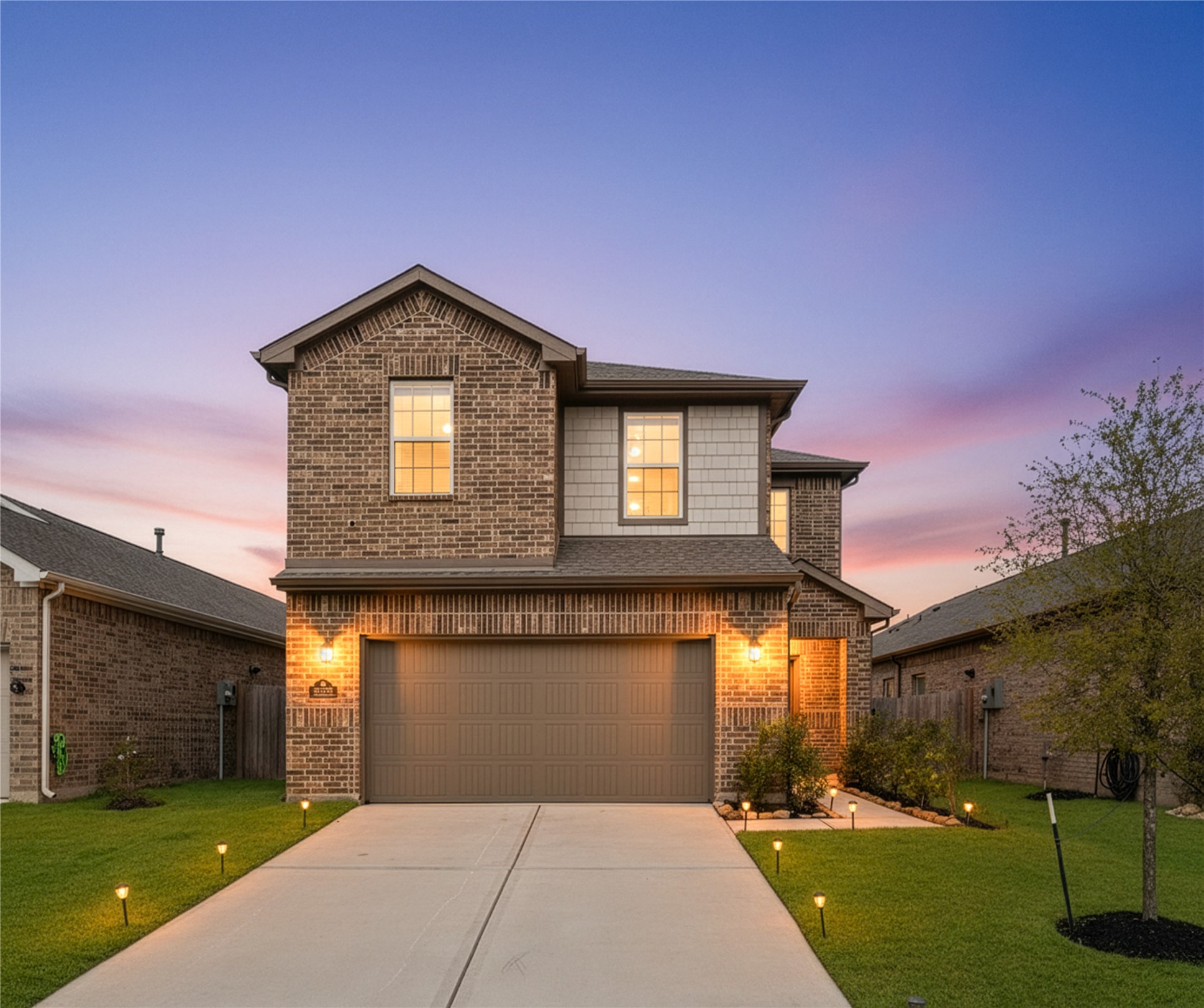 23326 Spring Genesis Lane Katy, TX 77493 - Photo 1 of 32 a front view of a house with a yard