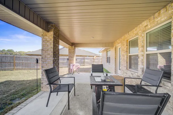 a building outdoor space with patio furniture