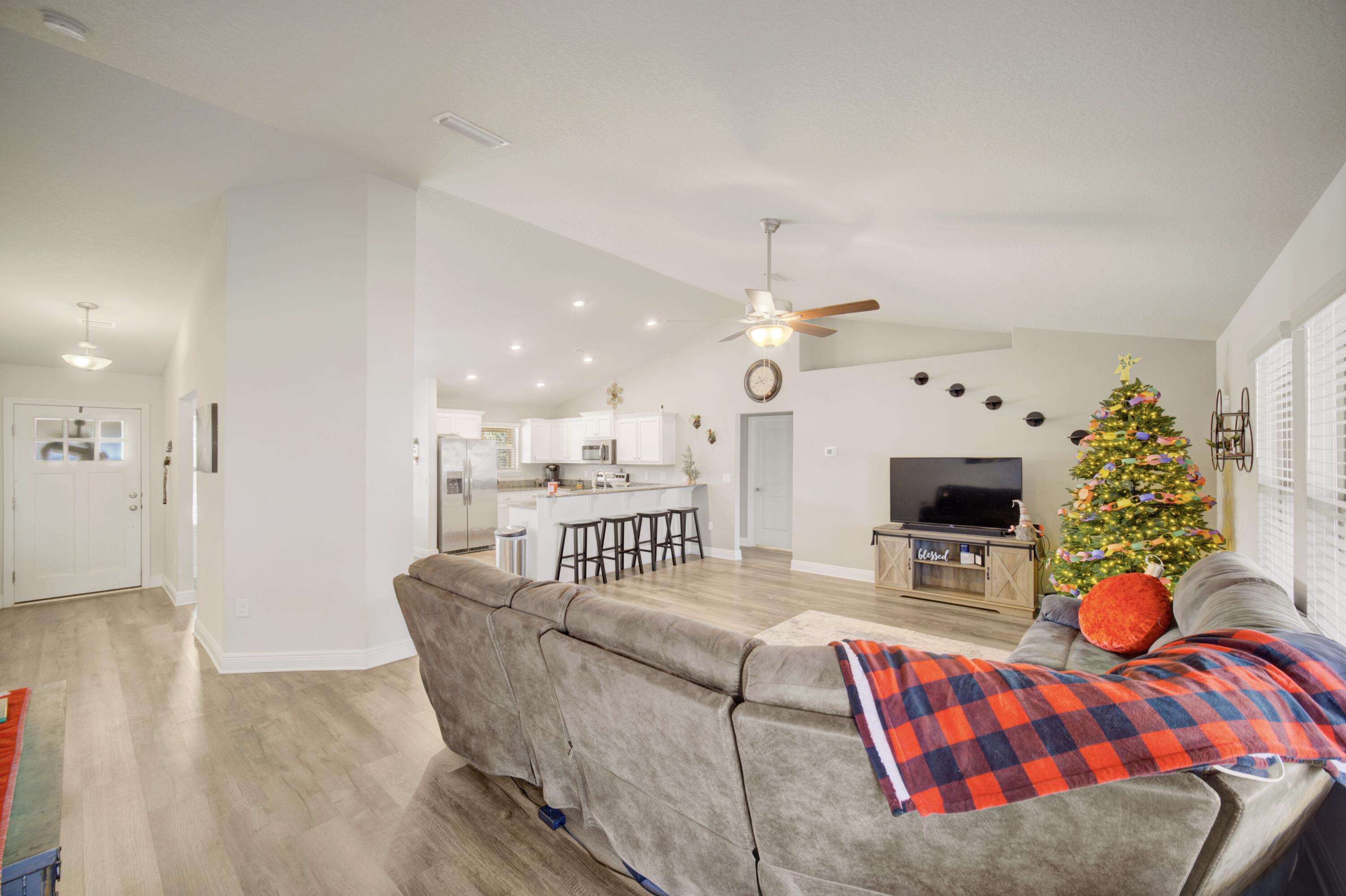 2045 Broad Street Crestview, FL 32536 - Photo 8 of 36 a living room with furniture and a fireplace