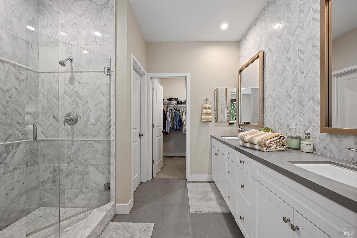 228 Johnson Street Windsor, CA 95492 - Photo 20 of 32 a spacious bathroom with a granite countertop sink mirror and shower