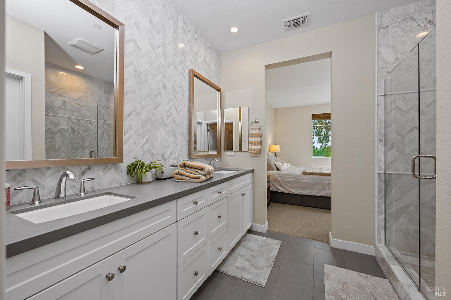 228 Johnson Street Windsor, CA 95492 - Photo 21 of 32 a en suite spacious bathroom with double sink and a large mirror