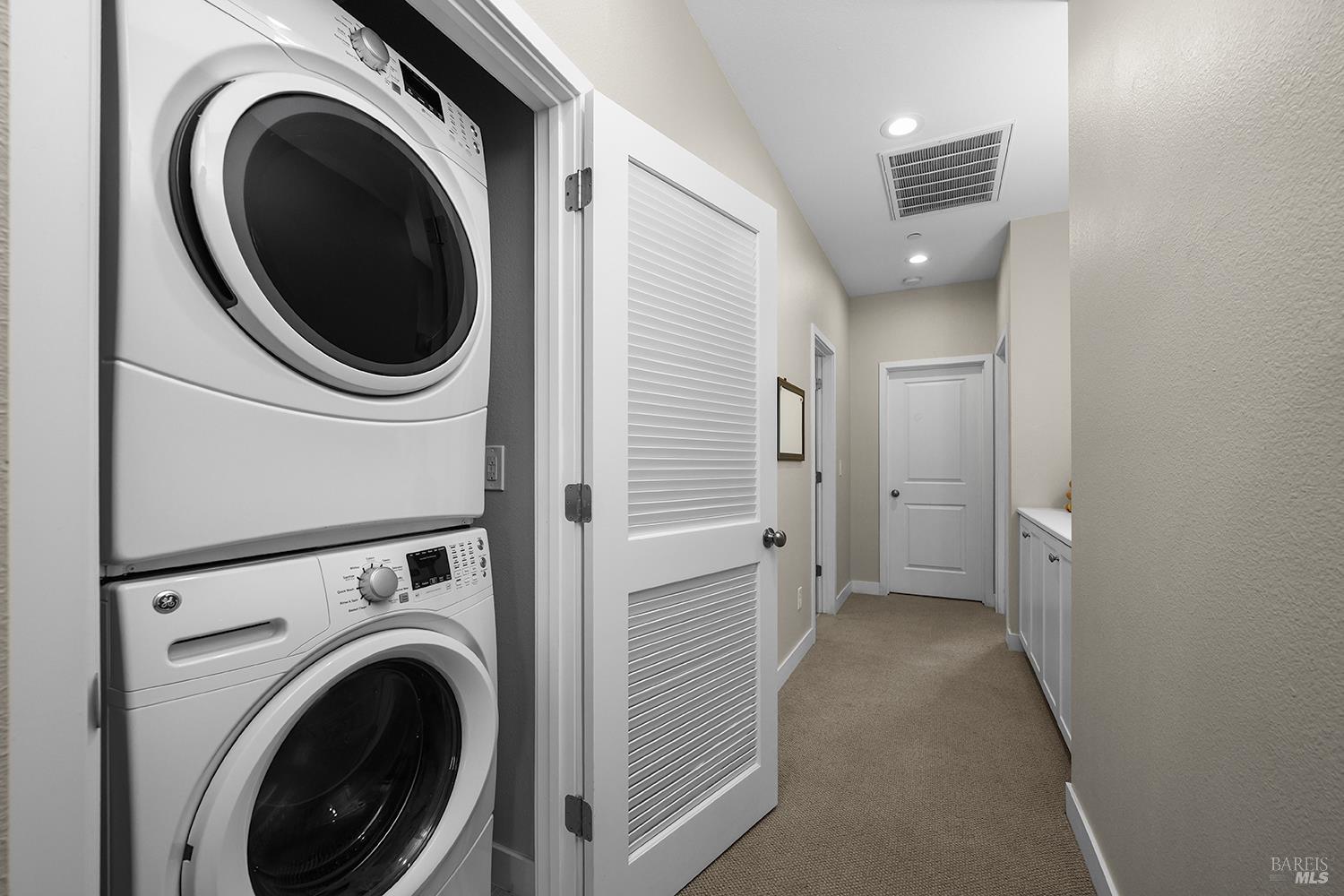 228 Johnson Street Windsor, CA 95492 - Photo 22 of 32 a view of a hallway with washer and dryer
