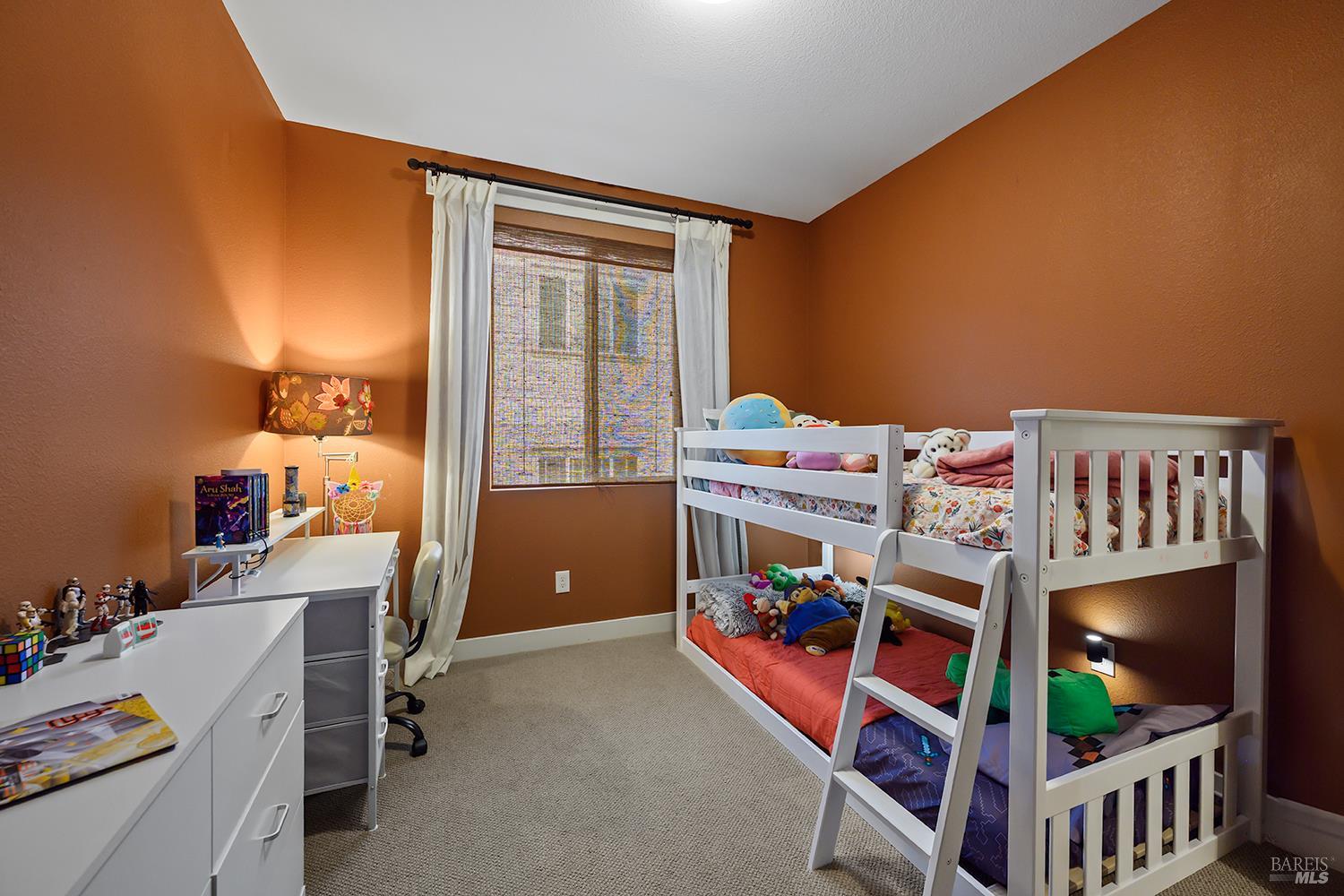 228 Johnson Street Windsor, CA 95492 - Photo 25 of 32 a kids room with a window and storage