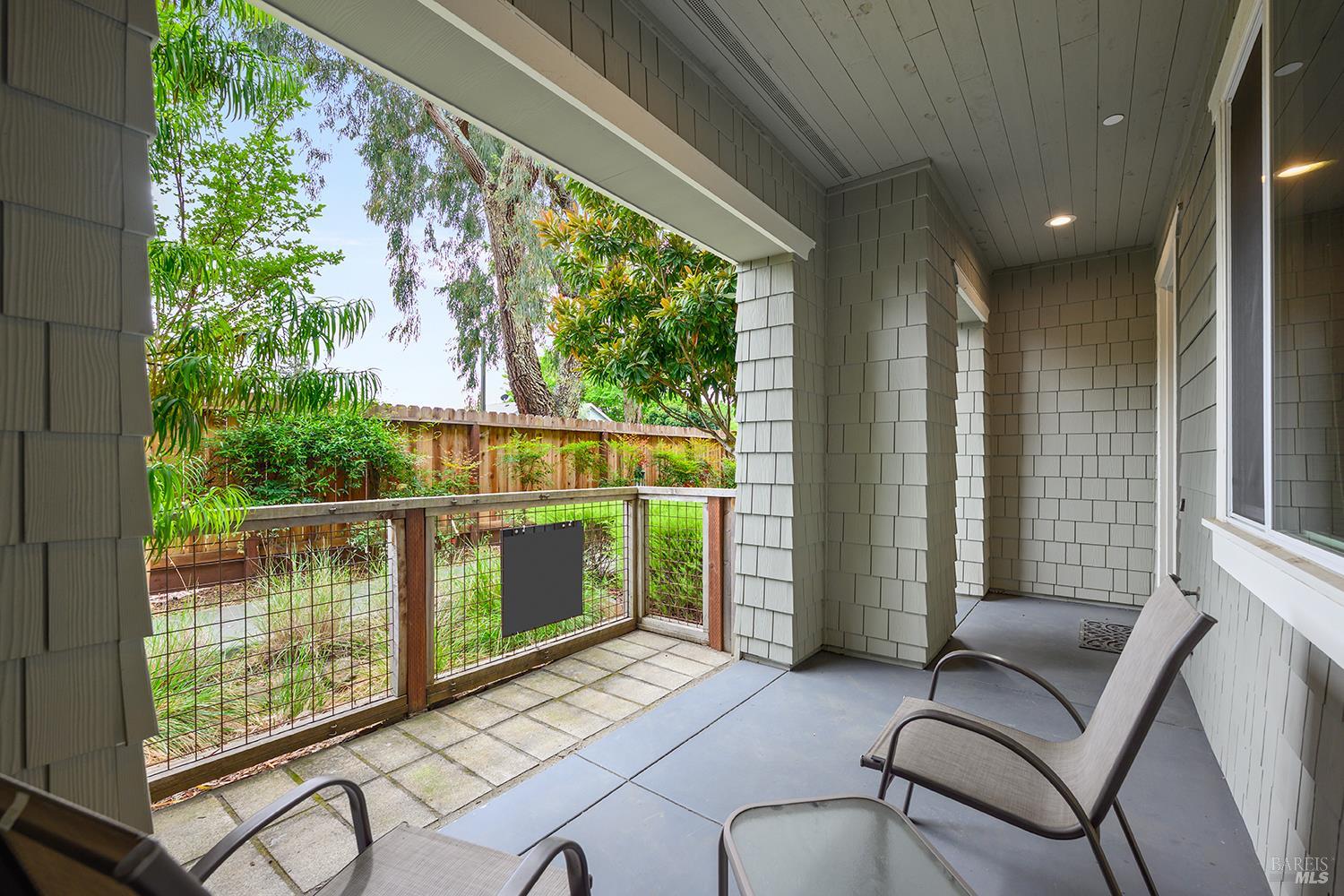 228 Johnson Street Windsor, CA 95492 - Photo 5 of 32 a balcony with furniture and a potted plant