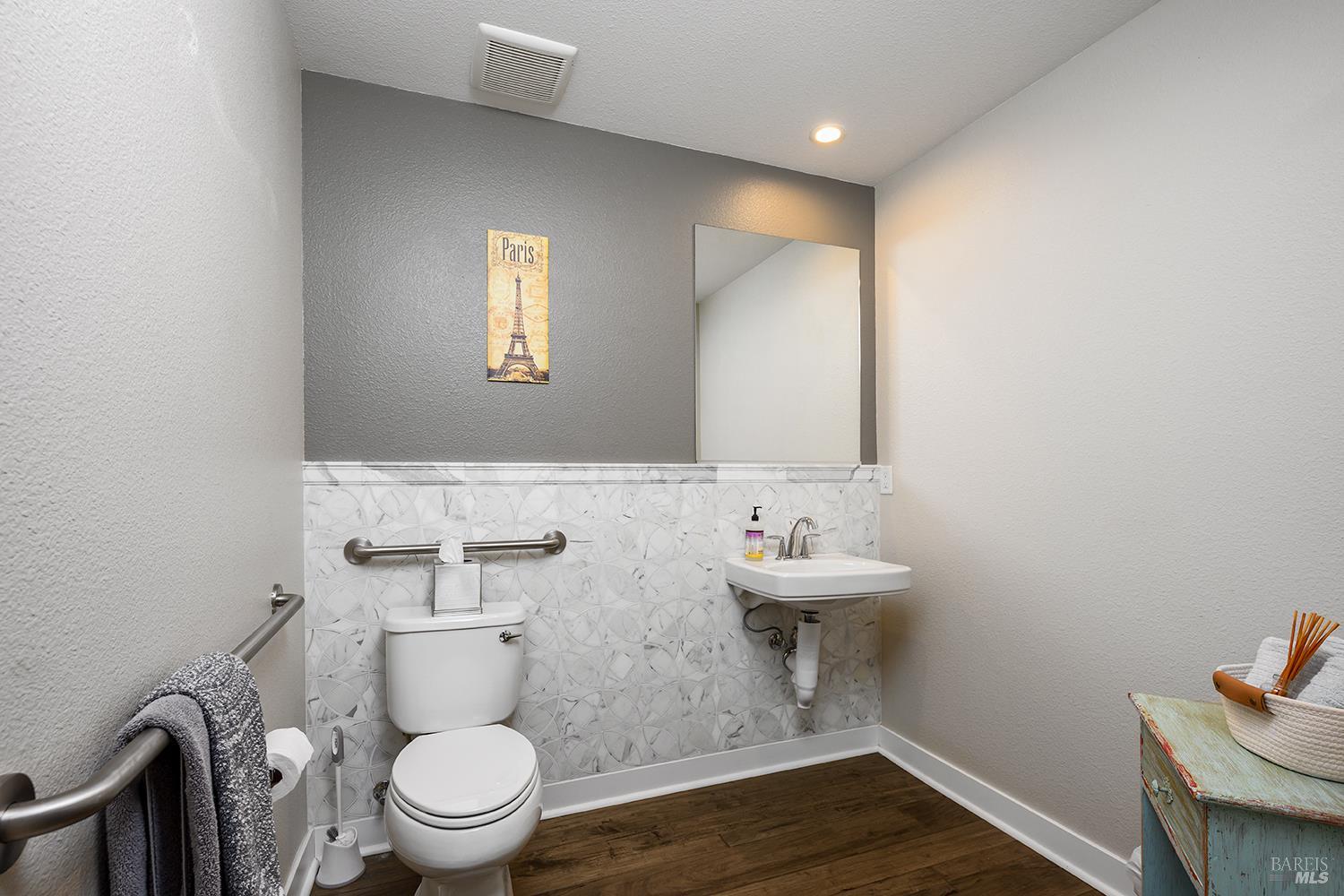 228 Johnson Street Windsor, CA 95492 - Photo 8 of 32 a bathroom with a toilet a sink and mirror