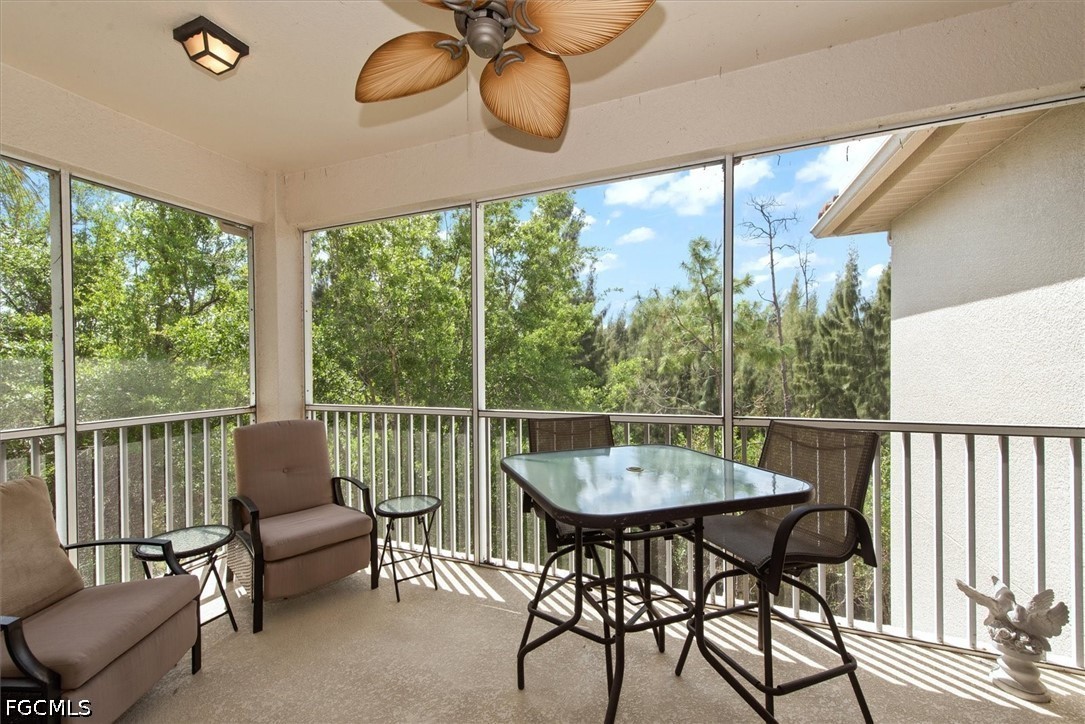 14951 Reflection Key Circle, Unit 531 Fort Myers, FL 33907 - Photo 15 of 36 a view of a chairs and table in patio
