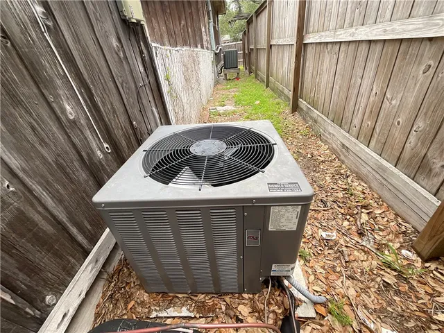 a view of a backyard with swimming pool