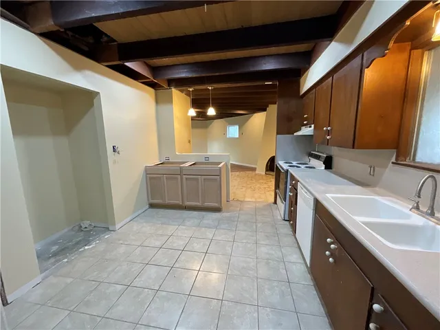 a bathroom with a sink a vanity and mirror
