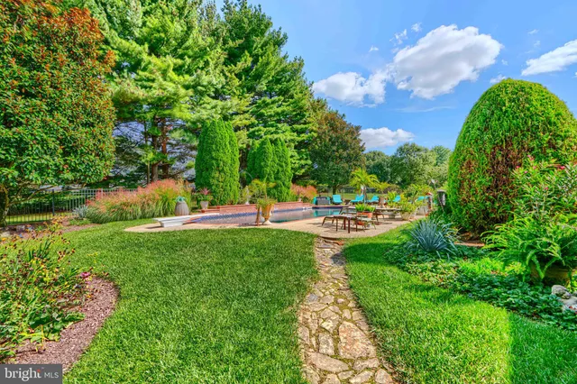 a view of swimming pool from a balcony