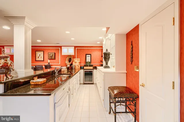 a kitchen with stainless steel appliances granite countertop a stove and a sink