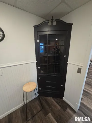 a workspace with furniture and wooden floor