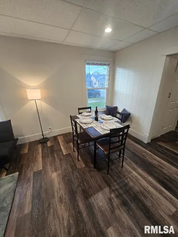 a view of a workspace with furniture