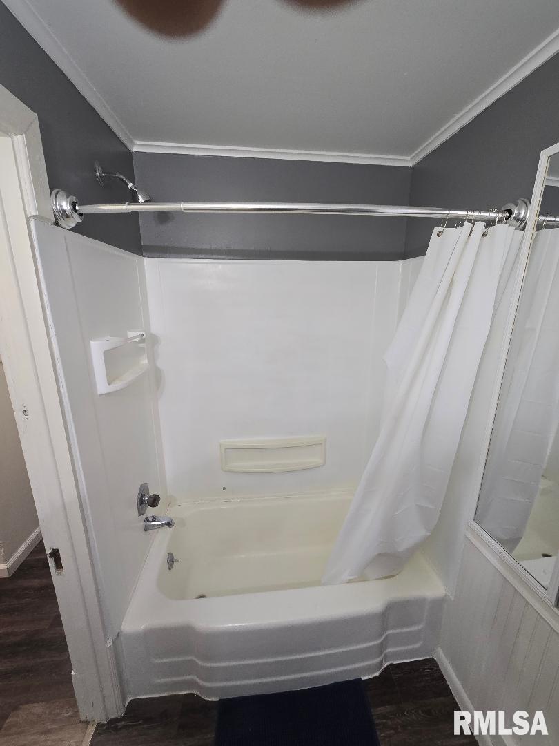 418 19th Avenue North Clinton, IA 52732 - Photo 20 of 28 a bathroom with a bathtub and a shower