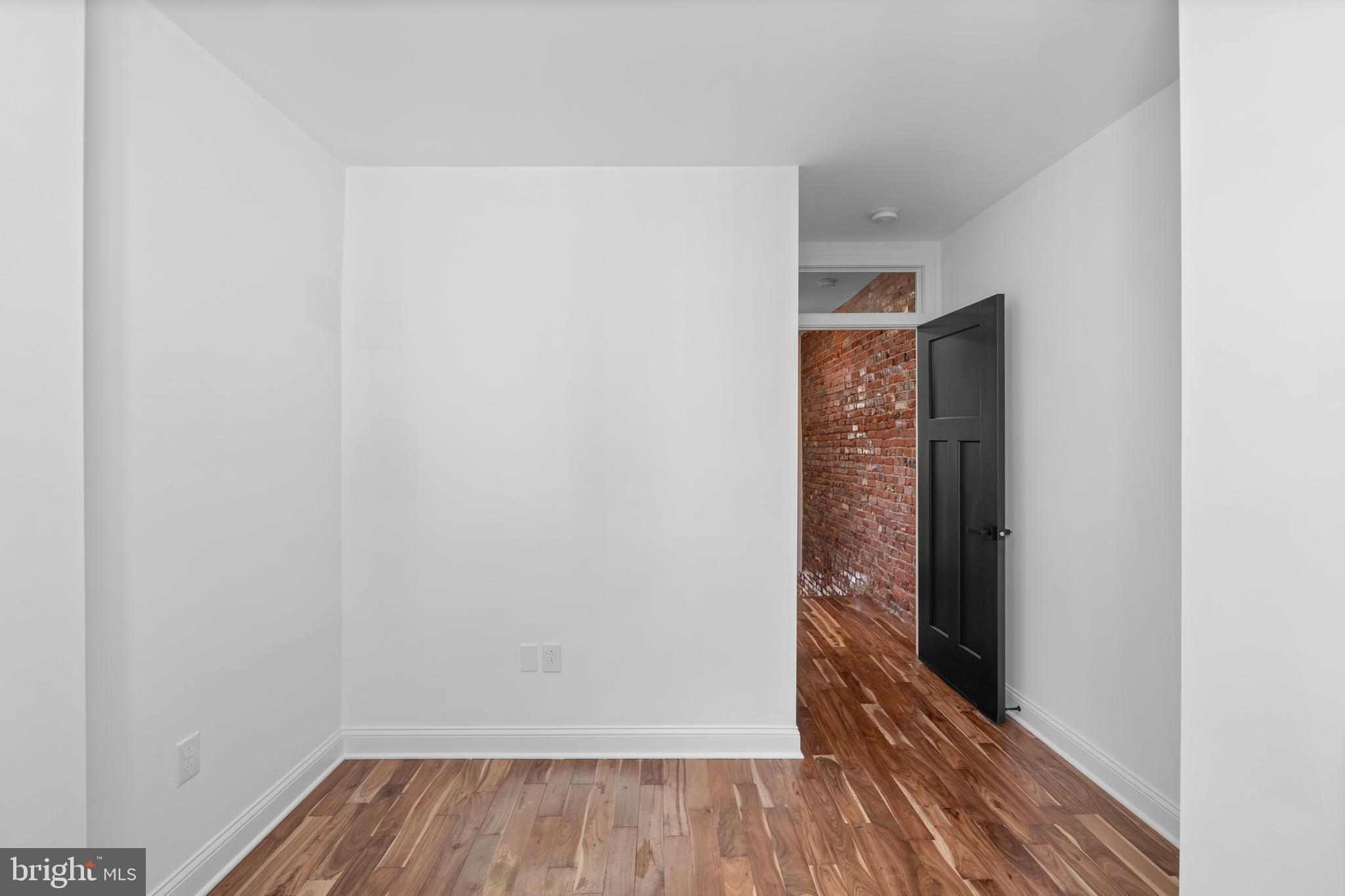 345 Roseberry Street Philadelphia, PA 19148 - Photo 20 of 30 a view of room with wooden floor