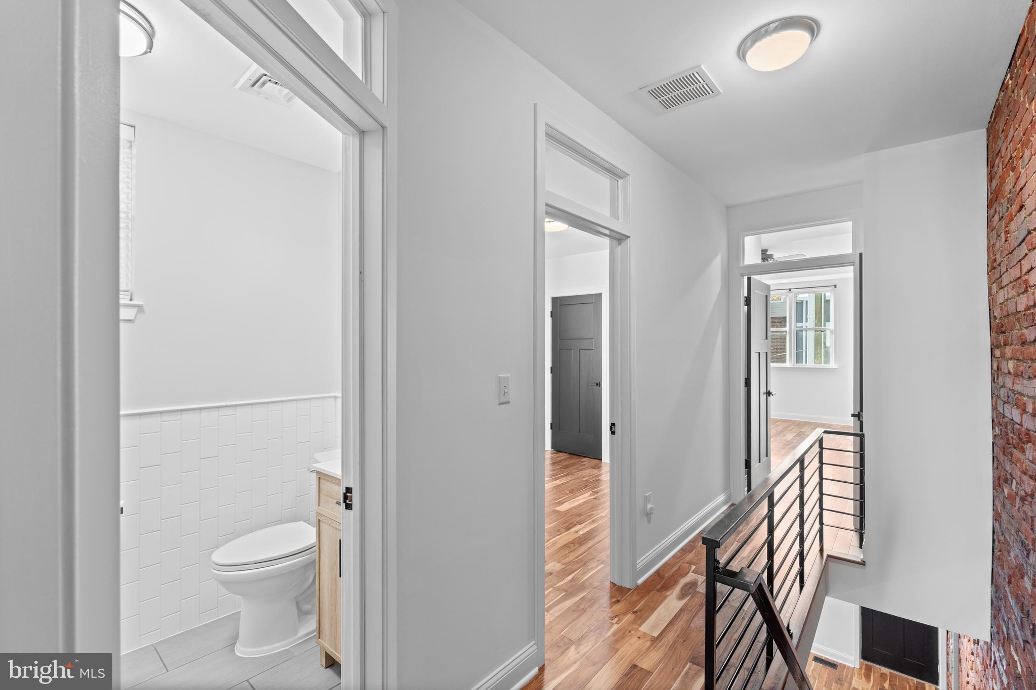 345 Roseberry Street Philadelphia, PA 19148 - Photo 21 of 30 a bathroom with a toilet and a shower