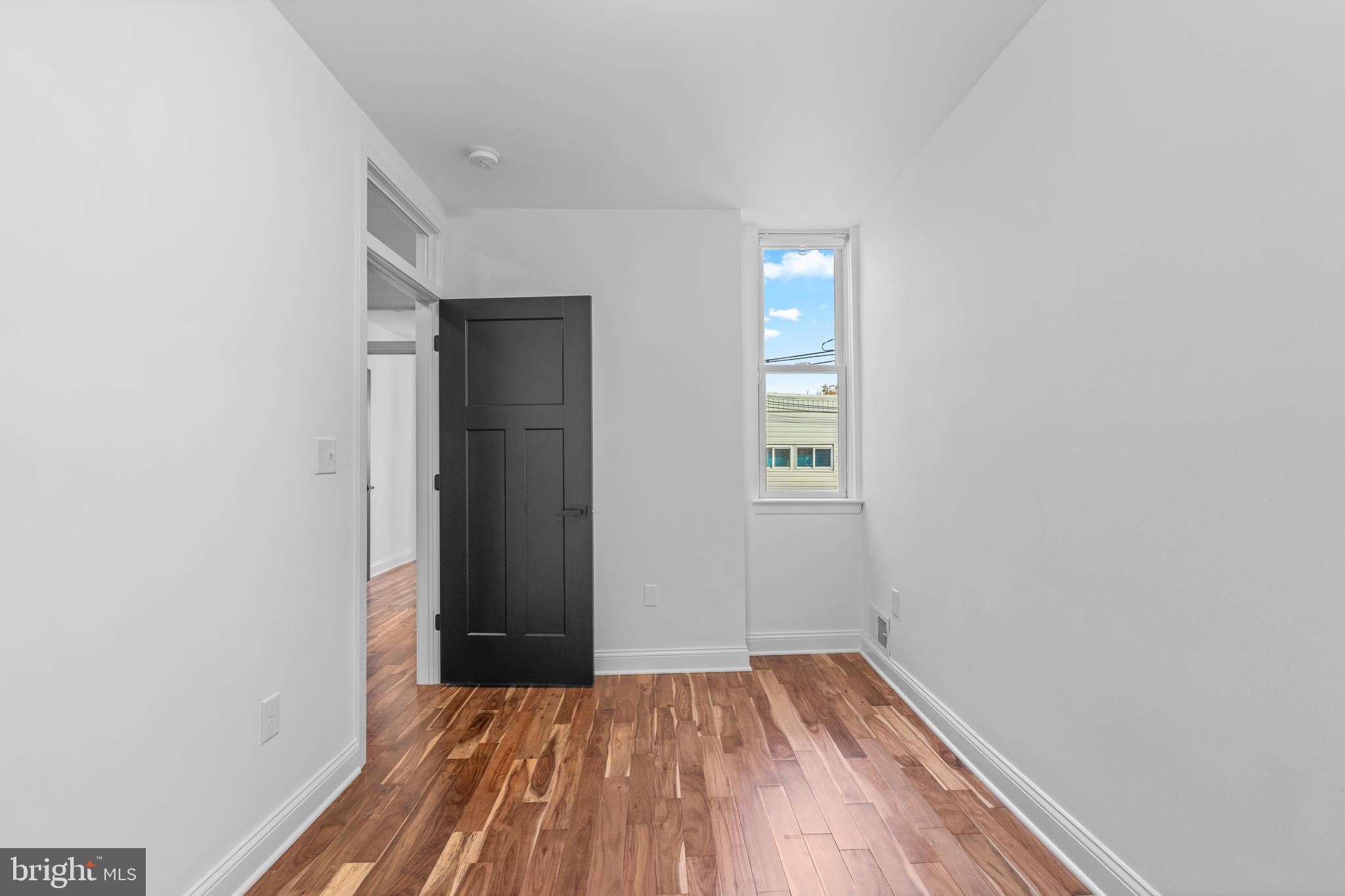 345 Roseberry Street Philadelphia, PA 19148 - Photo 25 of 30 wooden floor in an empty room