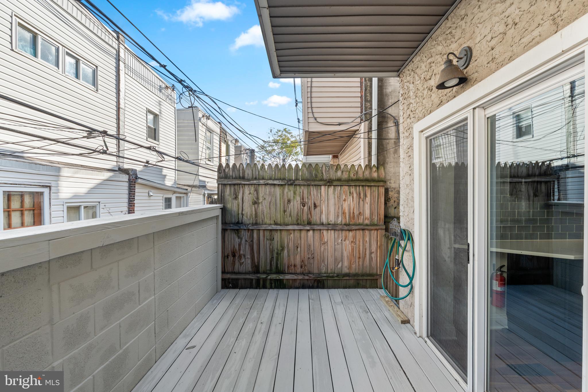 345 Roseberry Street Philadelphia, PA 19148 - Photo 29 of 30 a view of a balcony with wooden floor