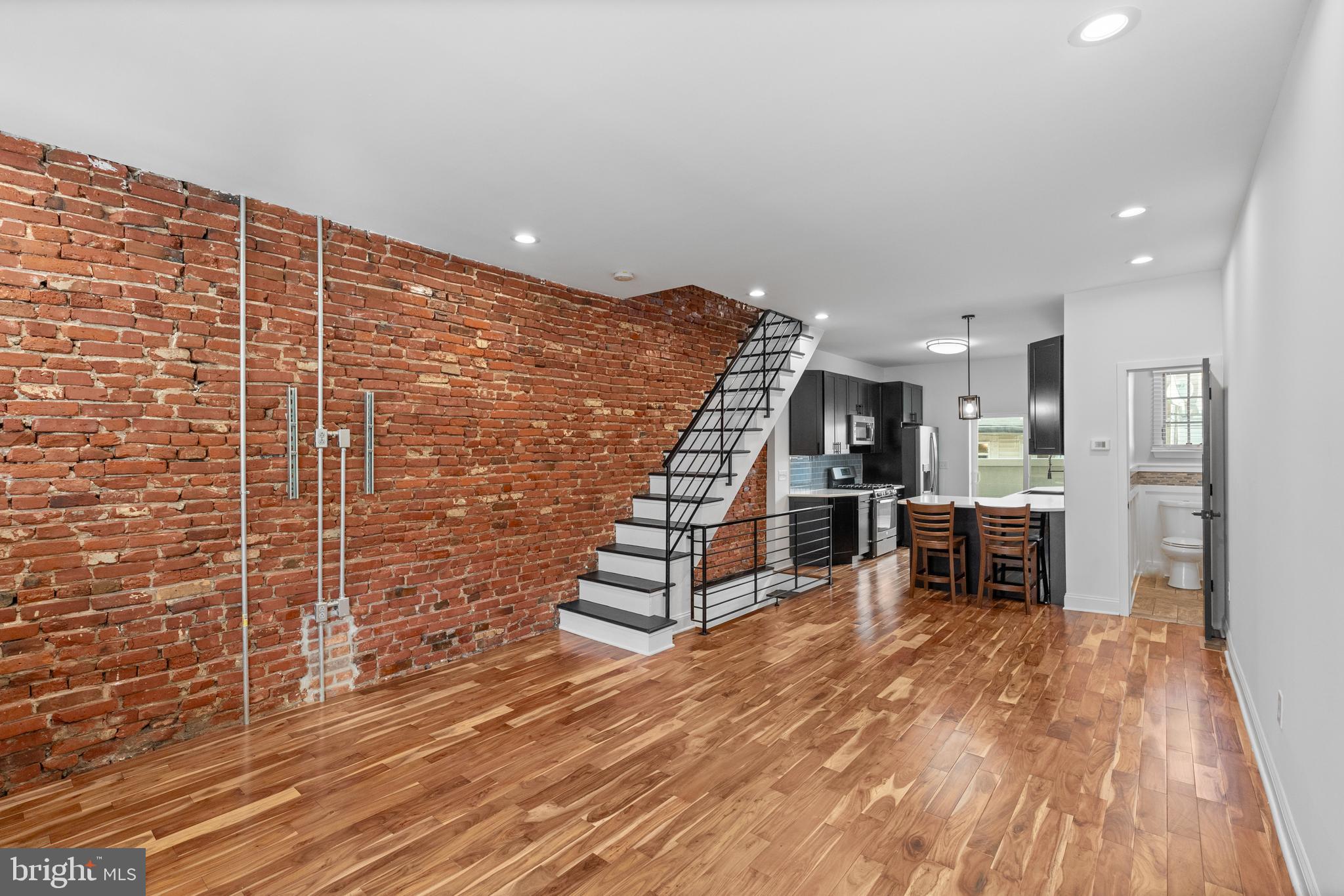 345 Roseberry Street Philadelphia, PA 19148 - Photo 10 of 30 a view of kitchen with furniture and wooden floor