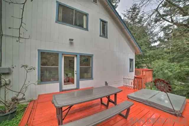 a backyard of a house with seating space