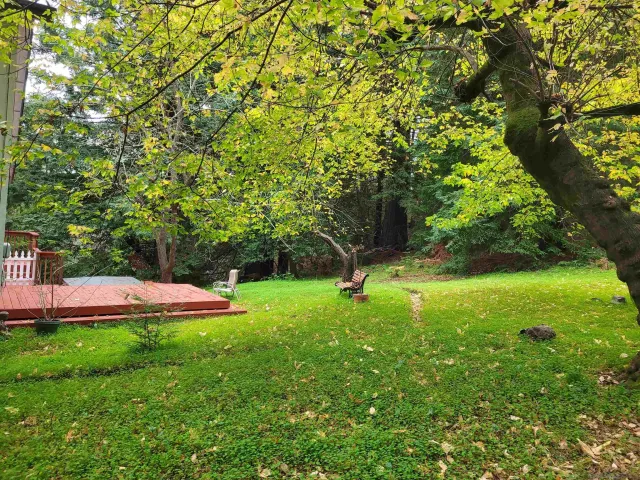 a car parked in front of a white house