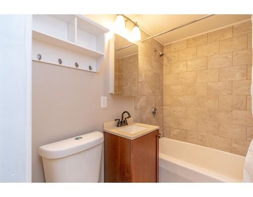 28 Barnet Street Springfield, MA 01129 - Photo 20 of 26 a bathroom with a sink a toilet and shower
