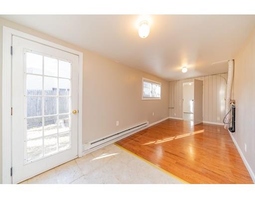 28 Barnet Street Springfield, MA 01129 - Photo 21 of 26 a view of an empty room with wooden floor and a window