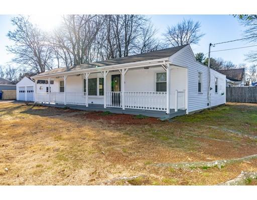 28 Barnet Street Springfield, MA 01129 - Photo 3 of 26 a front view of a house with a wooden deck