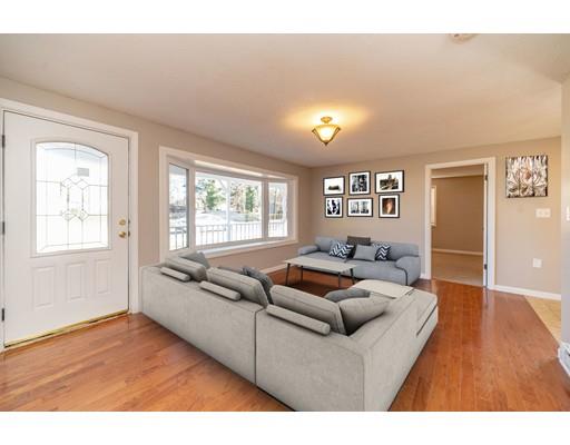 28 Barnet Street Springfield, MA 01129 - Photo 5 of 26 a living room with furniture and a window
