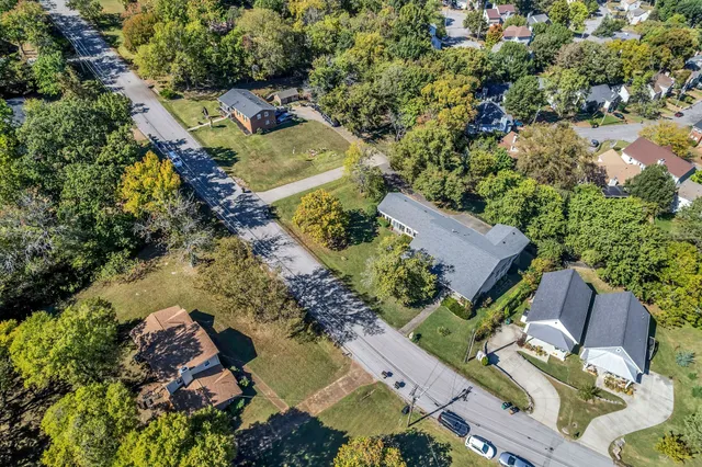 an aerial view of residential house with outdoor space