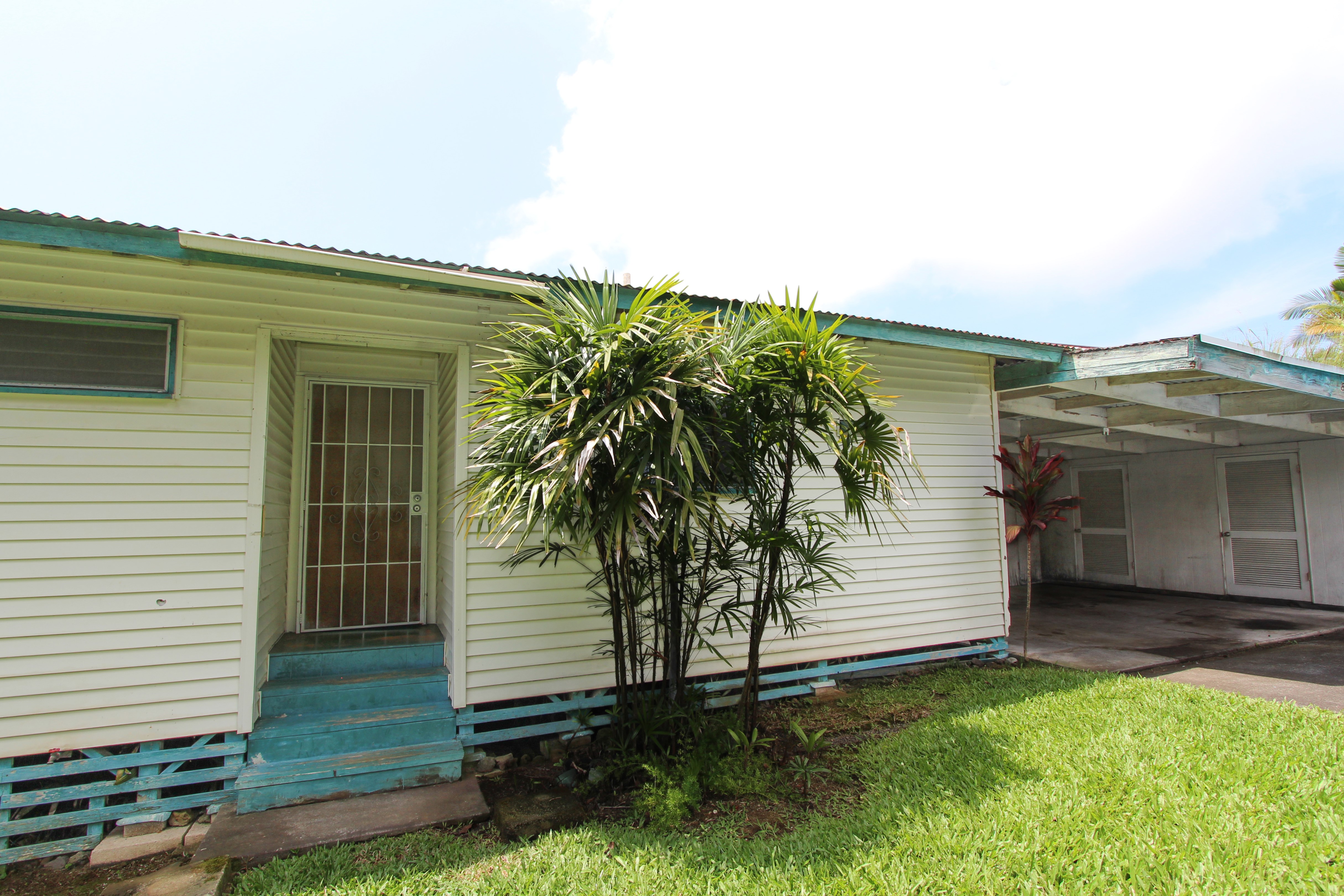 82-1025 Kinue Road Captain Cook, HI 96704 - Photo 2 of 12 a view of a house with a yard