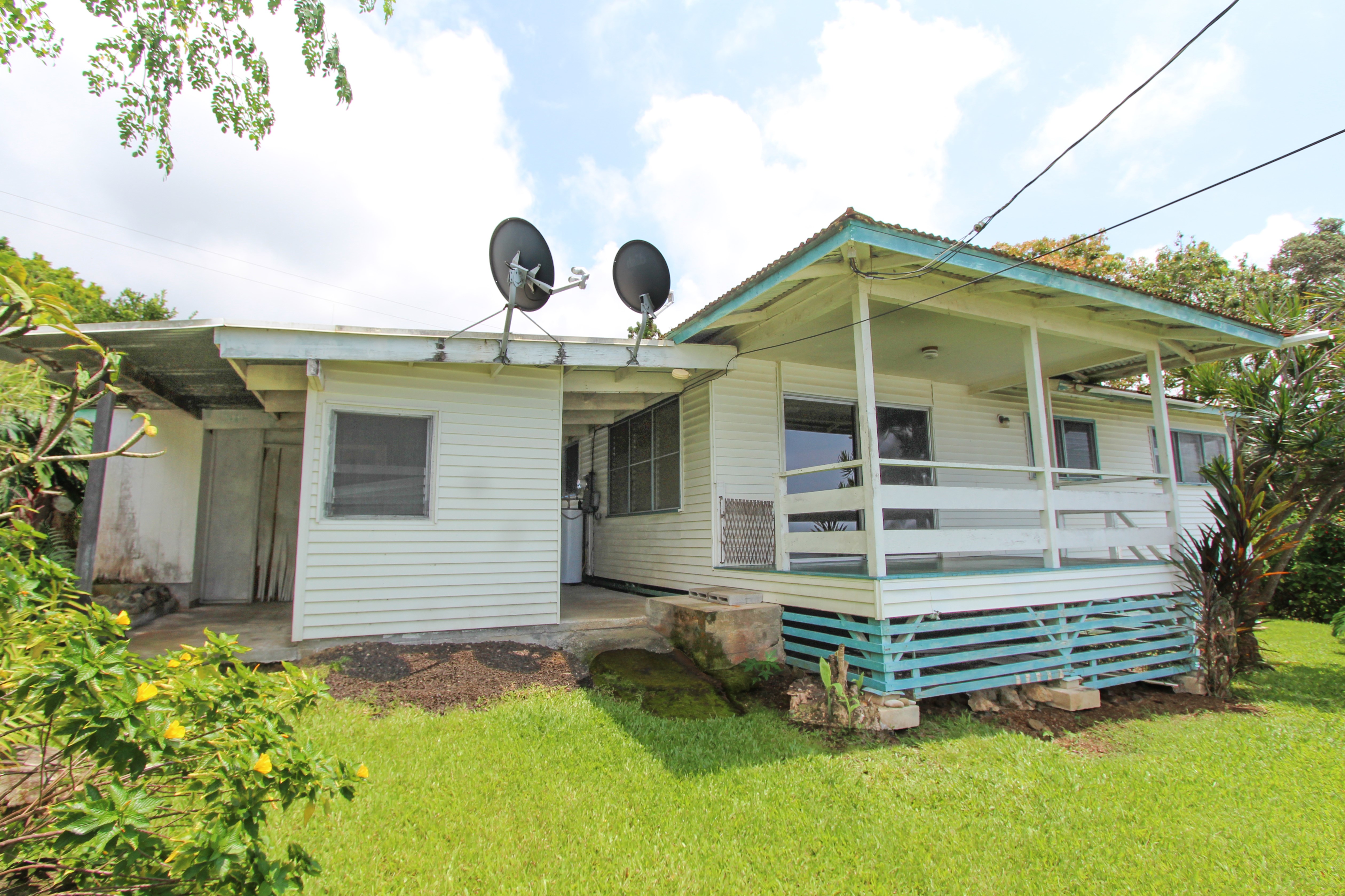 82-1025 Kinue Road Captain Cook, HI 96704 - Photo 3 of 12 a front view of a house with garden