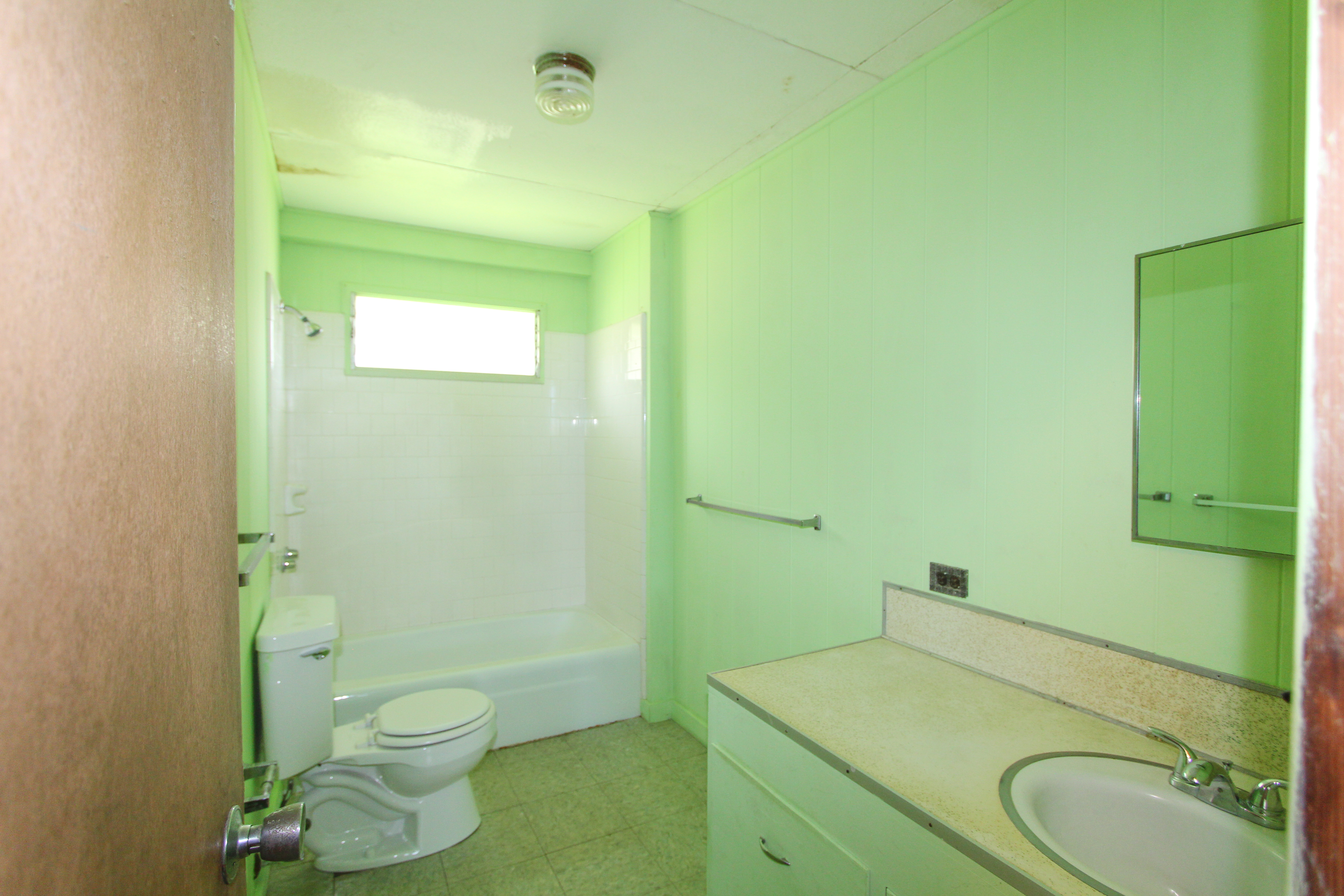 82-1025 Kinue Road Captain Cook, HI 96704 - Photo 6 of 12 a bathroom with a sink and a toilet