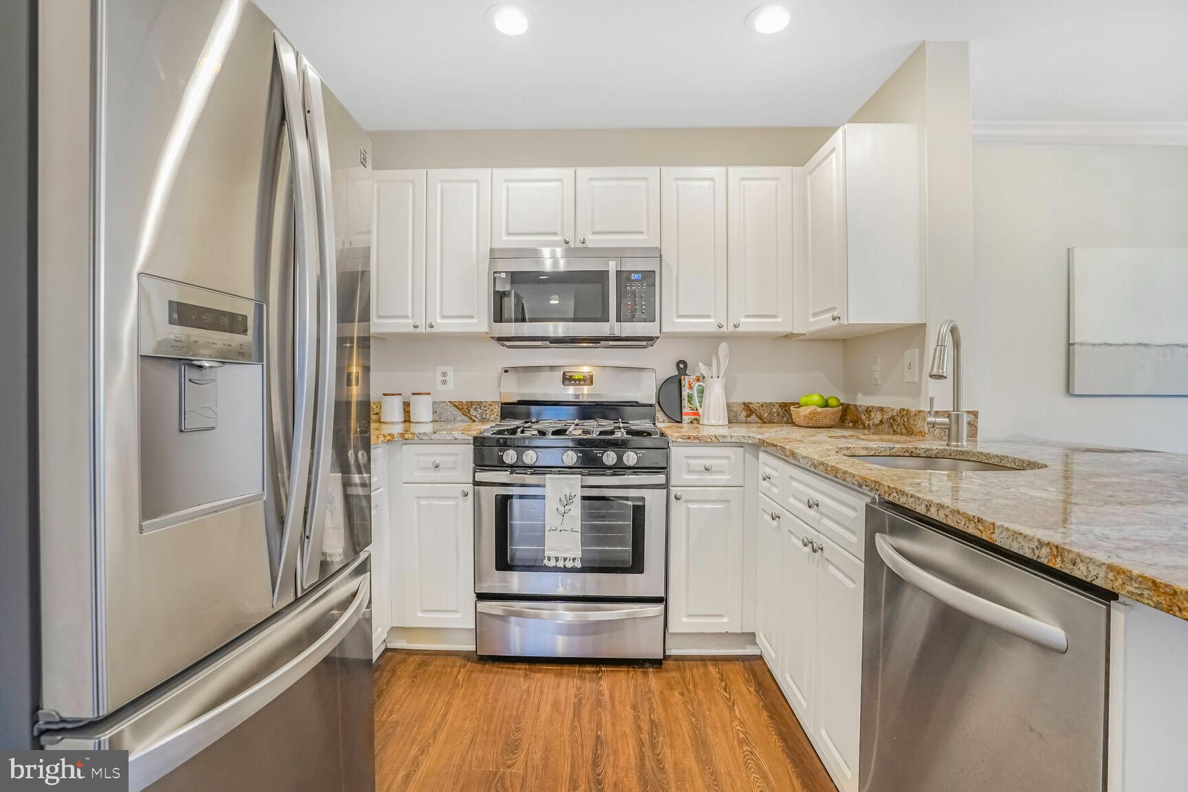 5575 Seminary Road, Unit 213 Falls Church, VA 22041 - Photo 22 of 77 Kitchen is Stunning! On-Trend White Cabinets!