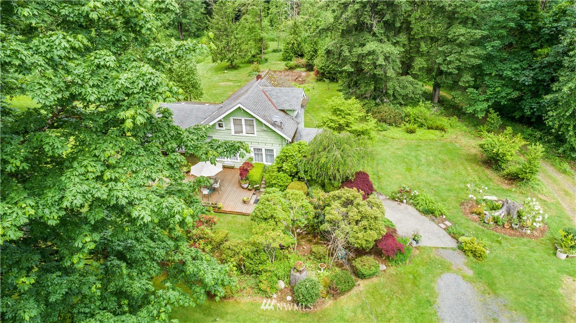 16825 Three Lakes Road Snohomish, WA 98290 - Photo 1 of 32 a aerial view of a house with a yard and street