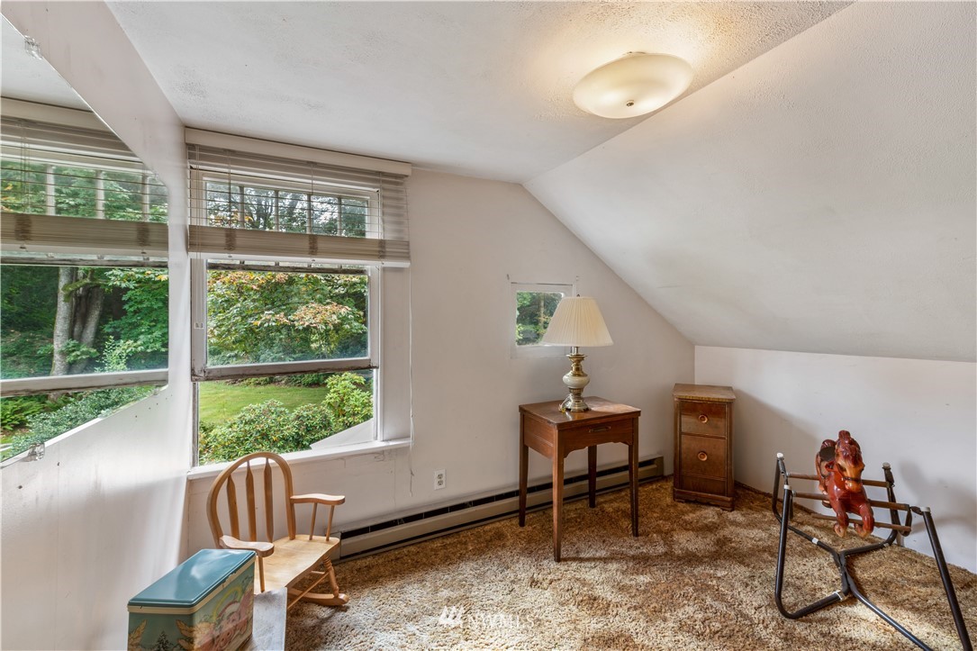 16825 Three Lakes Road Snohomish, WA 98290 - Photo 18 of 32 a living room with furniture and a window