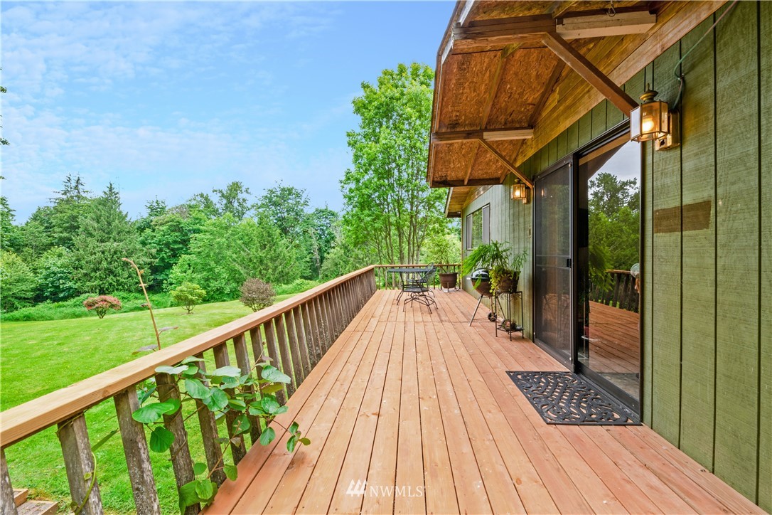 16825 Three Lakes Road Snohomish, WA 98290 - Photo 20 of 32 a view of balcony with wooden floor