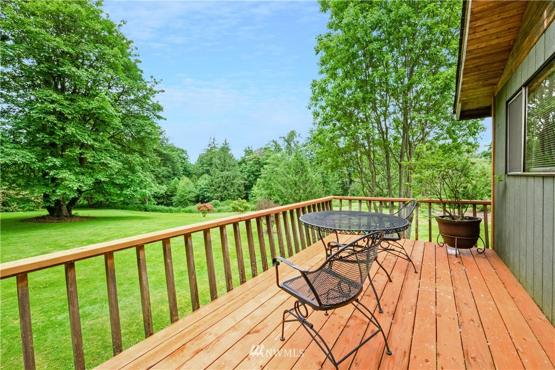 16825 Three Lakes Road Snohomish, WA 98290 - Photo 21 of 32 a view of balcony with furniture