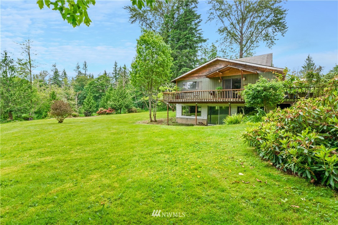 16825 Three Lakes Road Snohomish, WA 98290 - Photo 25 of 32 a front view of a house with yard and green space