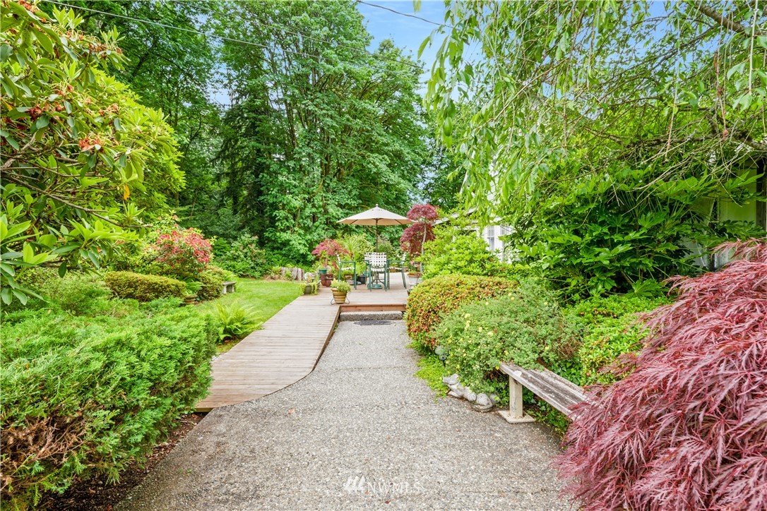 16825 Three Lakes Road Snohomish, WA 98290 - Photo 5 of 32 a view of a pathway of a garden