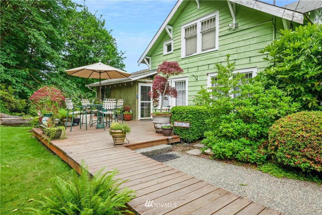 16825 Three Lakes Road Snohomish, WA 98290 - Photo 7 of 32 a view of a house with sitting area and garden